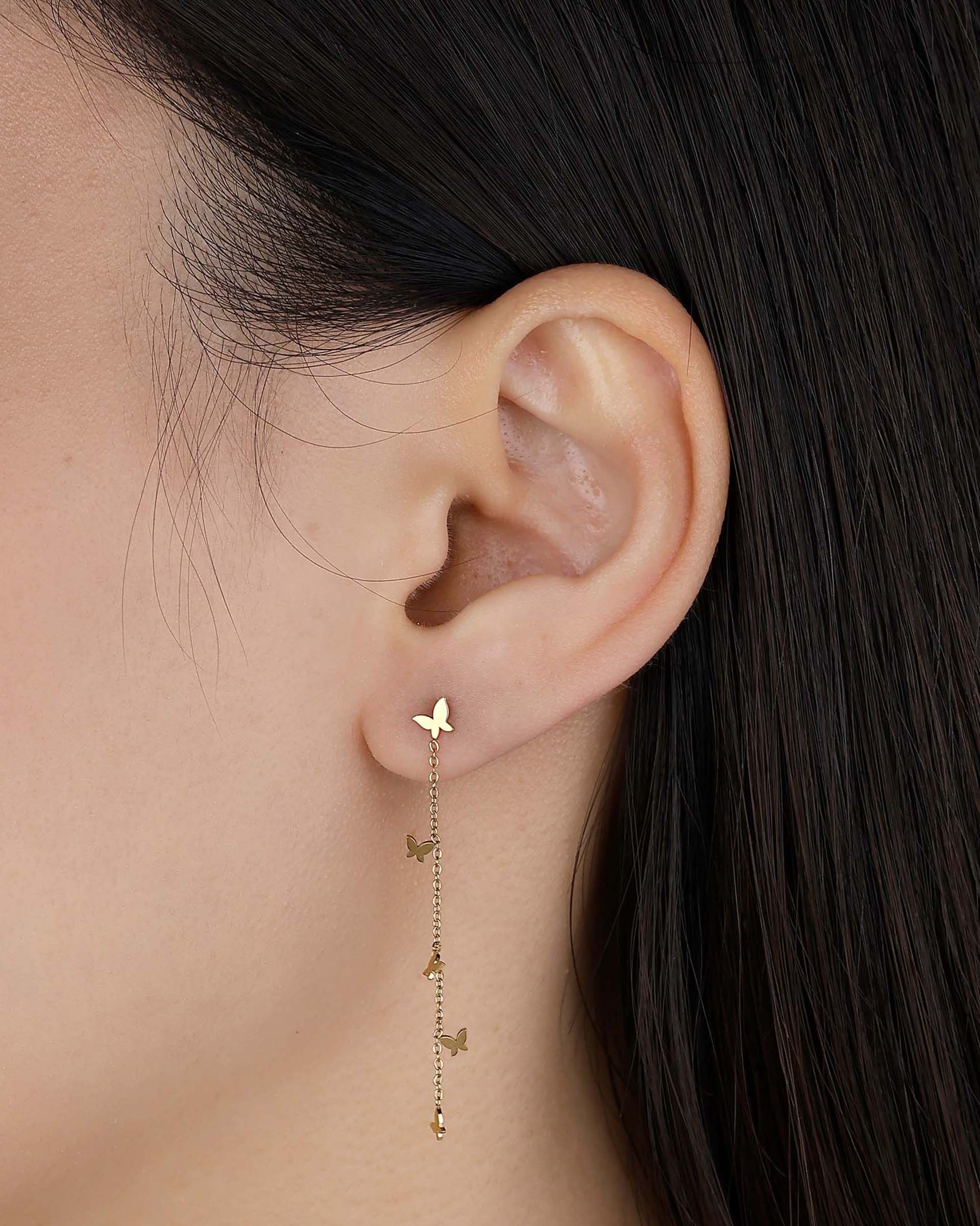 Tina Dangling Butterfly Earrings in Gold - Image 3